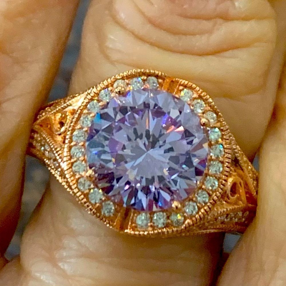 Gorgeous designer ring . Lavender and white CZ set in Rose gold over silver